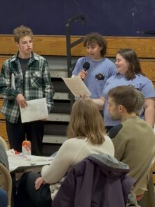 Left to right: Youth Council members leading the meeting Declan Sullivan, Naveen Lalanne (holding the mic) and Maddie McKinley